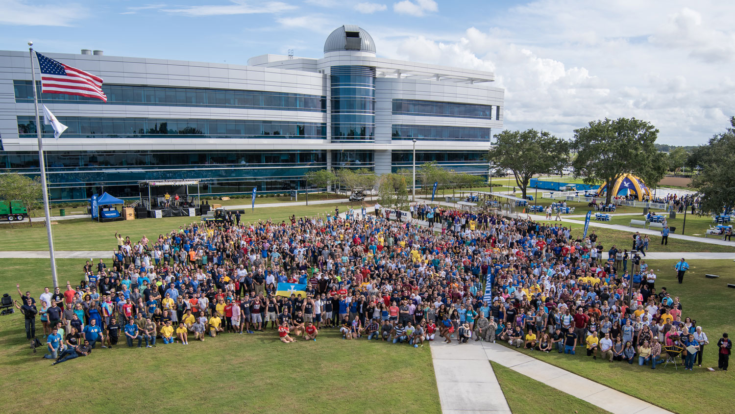 Students, alumni, faculty and staff gathered for a historic all-campus photo at the Operation Bootstrap 50th Anniversary celebration. (Daryl Labello photo)