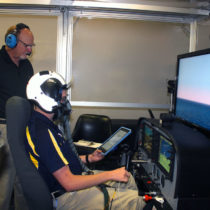 Joshua Swain takes part in pilot hypoxia training inside Embry-Riddle's High-Altitude Laboratory.