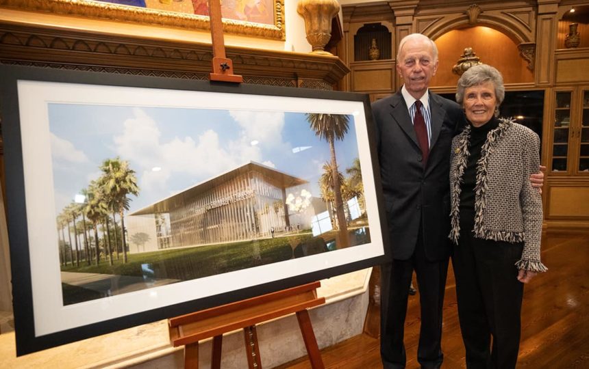 Hyatt and Cici Brown pose with the rendering for the Center for Aerospace Technology