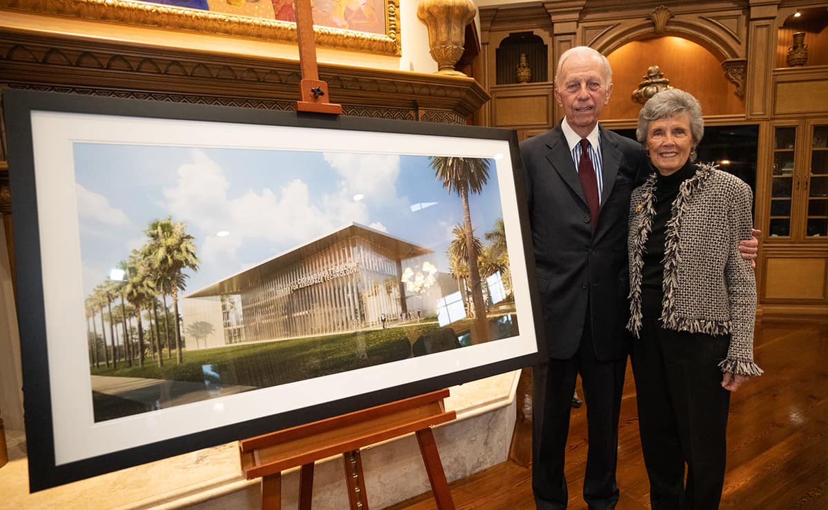 Hyatt and Cici Brown pose with a rendering for the new Center for Aerospace Technology