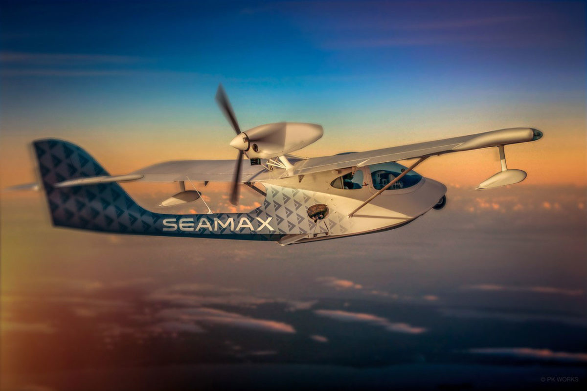 Seamax aircraft at cruise altitude during sunset.