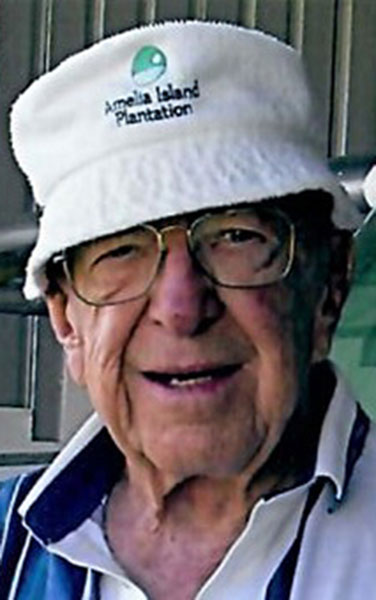 Walter McFadden wearing glasses and a white hat